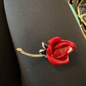 Keneth Jay Lane red lucite brooch with black enamel and rhinestone accents